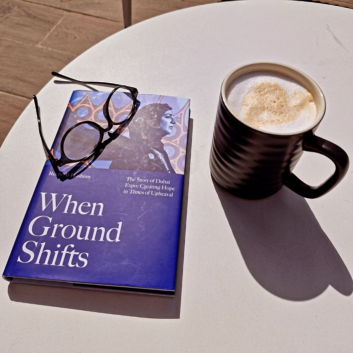 Saturday morning, book and Chai Karak by the pool. 🌞🫖📖